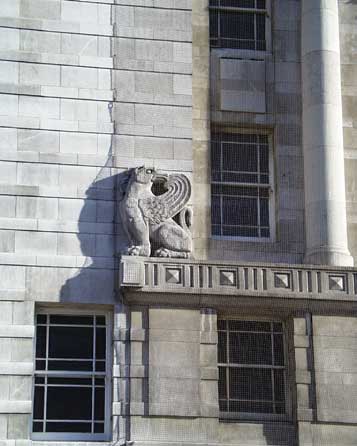 The griffins look backwards, like the design!