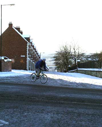 Boy on bike, West View